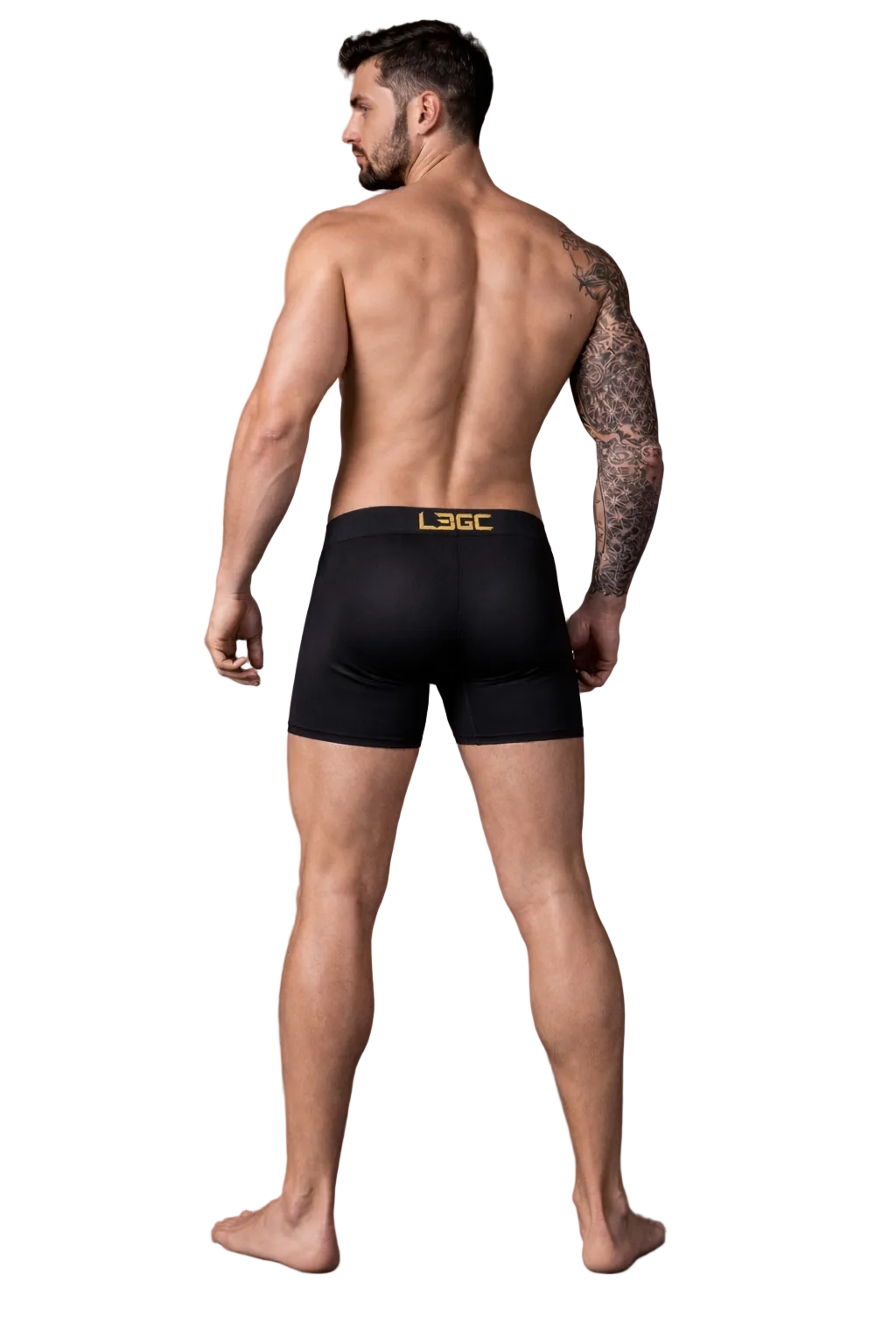 Man wearing black boxer briefs with 'L3GG' branding on a dark background