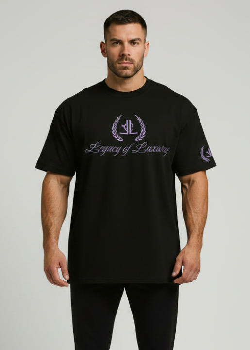 Man wearing a black t-shirt with 'Legacy of Luxury' logo on a gray background