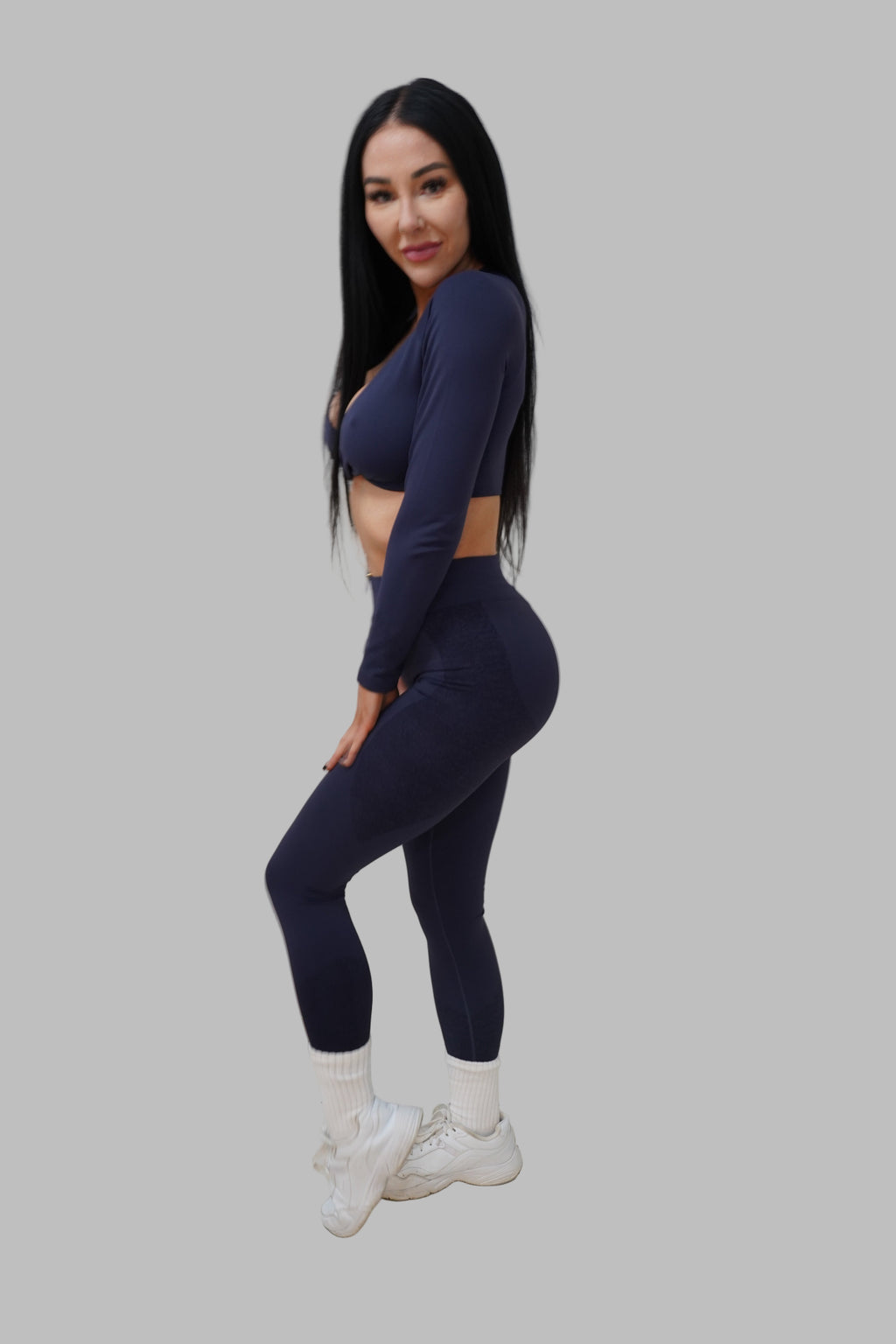 Person wearing a navy blue outfit.